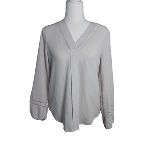 Cupio All White Long Sleeve with Elastic Hems around the wrist detail.